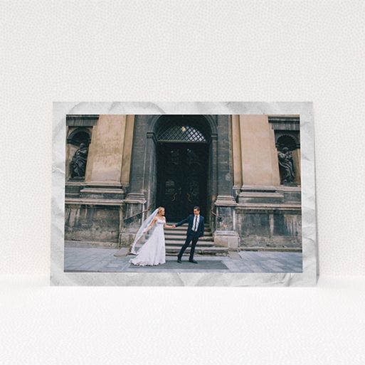 A wedding thank you card template titled "Sat on Marble". It is an A6 card in a landscape orientation. It is a photographic wedding thank you card with room for 1 photo. "Sat on Marble" is available as a flat card, with mainly white colouring.