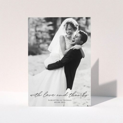 Wedding Thank You Card Design - "Script & Serif" A wedding thank you card design named "Script & Serif". It is an A5 card in a portrait orientation. It is a photographic wedding thank you card with room for 1 photo. "Script & Serif" is available as a folded card, with mainly black colouring.