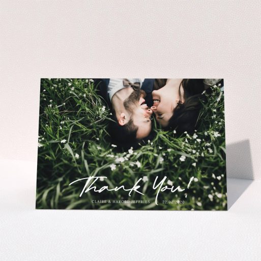 Wedding Thank You Card Design - "Simple Appreciation" A wedding thank you card template titled "Simple Appreciation". It is an A5 card in a landscape orientation. It is a photographic wedding thank you card with room for 1 photo. "Simple Appreciation" is available as a folded card, with mainly white colouring.