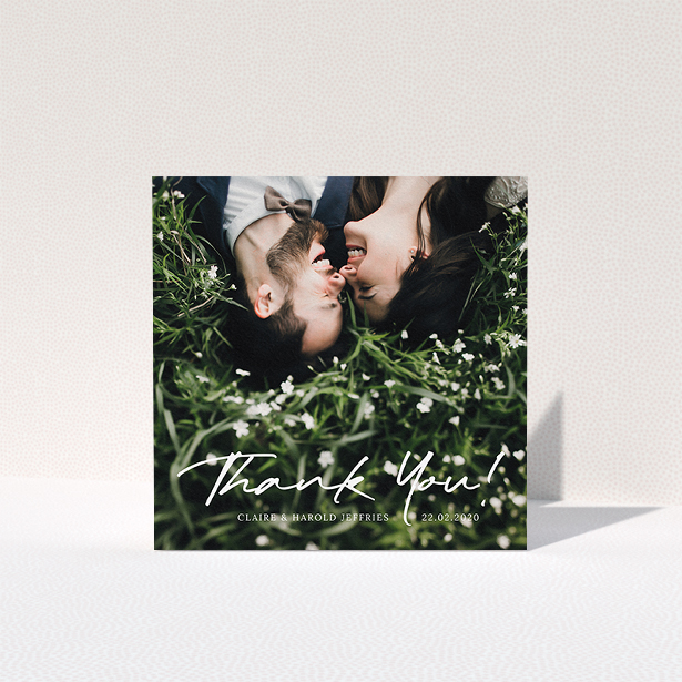 A wedding thank you card design named "Simple Appreciation". It is a square (148mm x 148mm) card in a square orientation. It is a photographic wedding thank you card with room for 1 photo. "Simple Appreciation" is available as a folded card, with mainly white colouring.