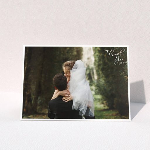 A wedding thank you card named "Simple Landscape Thanks". It is an A5 card in a landscape orientation. It is a photographic wedding thank you card with room for 1 photo. "Simple Landscape Thanks" is available as a folded card, with mainly white colouring.