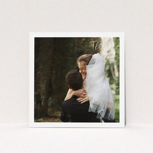 A wedding thank you card design called "Simple Landscape Thanks". It is a square (148mm x 148mm) card in a square orientation. It is a photographic wedding thank you card with room for 1 photo. "Simple Landscape Thanks" is available as a flat card, with mainly white colouring.