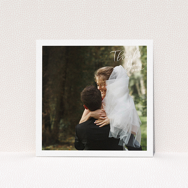 A wedding thank you card design called "Simple Landscape Thanks". It is a square (148mm x 148mm) card in a square orientation. It is a photographic wedding thank you card with room for 1 photo. "Simple Landscape Thanks" is available as a flat card, with mainly white colouring.