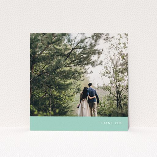 A wedding thank you card template titled "Simple Mint". It is a square (148mm x 148mm) card in a square orientation. It is a photographic wedding thank you card with room for 1 photo. "Simple Mint" is available as a flat card, with tones of green and white.