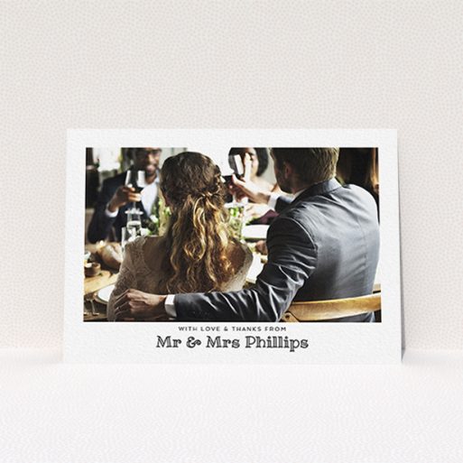 A wedding thank you card design called "Simple Photo Frame". It is an A6 card in a landscape orientation. It is a photographic wedding thank you card with room for 1 photo. "Simple Photo Frame" is available as a flat card, with mainly white colouring.
