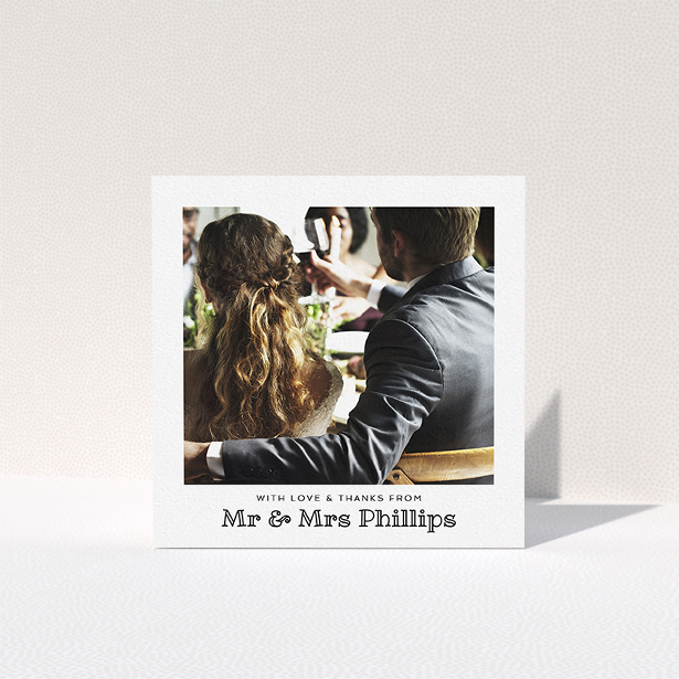 A wedding thank you card called "Simple Photo Frame". It is a square (148mm x 148mm) card in a square orientation. It is a photographic wedding thank you card with room for 1 photo. "Simple Photo Frame" is available as a folded card, with mainly white colouring.