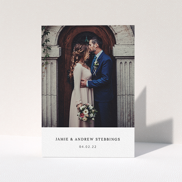 A wedding thank you card template titled "Simple, Portrait Thank You". It is an A6 card in a portrait orientation. It is a photographic wedding thank you card with room for 1 photo. "Simple, Portrait Thank You" is available as a folded card, with mainly white colouring.