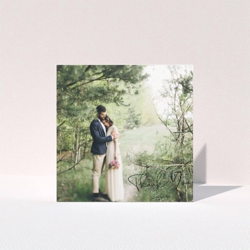 A wedding thank you card design named "Simple Square Thanks". It is a square (148mm x 148mm) card in a square orientation. It is a photographic wedding thank you card with room for 1 photo. "Simple Square Thanks" is available as a folded card, with mainly black colouring.
