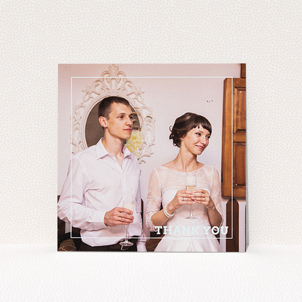 A wedding thank you card design named "Simple Thank You Frame". It is a square (148mm x 148mm) card in a square orientation. It is a photographic wedding thank you card with room for 1 photo. "Simple Thank You Frame" is available as a flat card, with mainly white colouring.