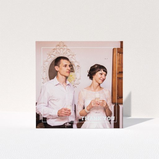 A wedding thank you card design titled "Simple Thank You Frame". It is a square (148mm x 148mm) card in a square orientation. It is a photographic wedding thank you card with room for 1 photo. "Simple Thank You Frame" is available as a folded card, with mainly white colouring.