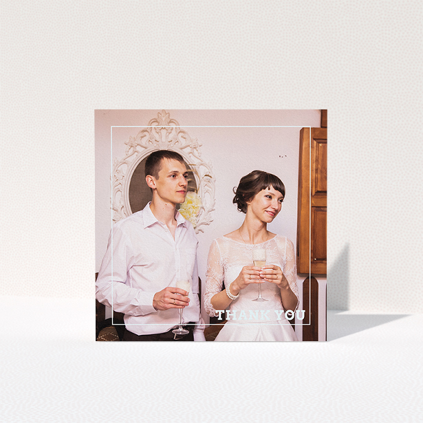 A wedding thank you card design titled "Simple Thank You Frame". It is a square (148mm x 148mm) card in a square orientation. It is a photographic wedding thank you card with room for 1 photo. "Simple Thank You Frame" is available as a folded card, with mainly white colouring.