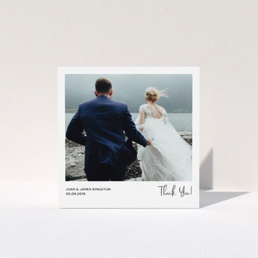 A wedding thank you card design titled "Simple Wedding Thank You". It is a square (148mm x 148mm) card in a square orientation. It is a photographic wedding thank you card with room for 1 photo. "Simple Wedding Thank You" is available as a folded card, with mainly white colouring.