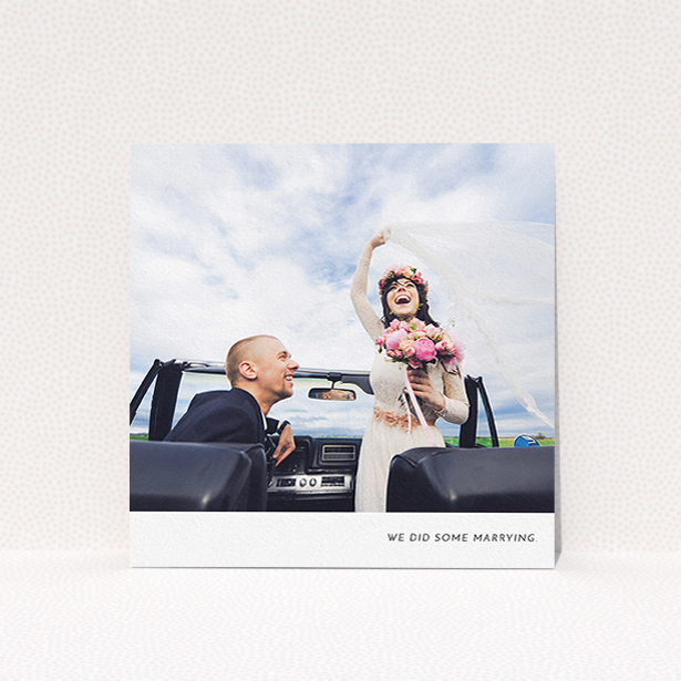A wedding thank you card named "Split into two". It is a square (148mm x 148mm) card in a square orientation. It is a photographic wedding thank you card with room for 2 photos. "Split into two" is available as a flat card, with mainly white colouring.