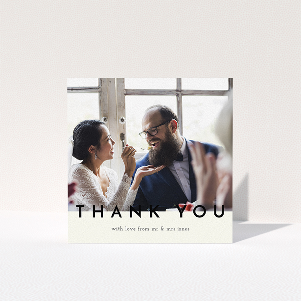 A wedding thank you card called "Split thank you ". It is a square (148mm x 148mm) card in a square orientation. It is a photographic wedding thank you card with room for 1 photo. "Split thank you " is available as a folded card, with mainly cream colouring.