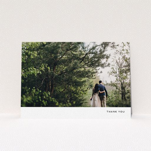 A wedding thank you card called "Thankful with Simplicity". It is an A6 card in a landscape orientation. It is a photographic wedding thank you card with room for 1 photo. "Thankful with Simplicity" is available as a flat card, with mainly white colouring.