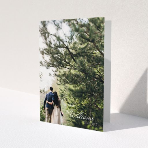 A wedding thank you card named 'Thanks Bottom-Right'. It is an A5 card in a portrait orientation. It is a photographic wedding thank you card with room for 1 photo. 'Thanks Bottom-Right' is available as a folded card, with mainly white colouring.