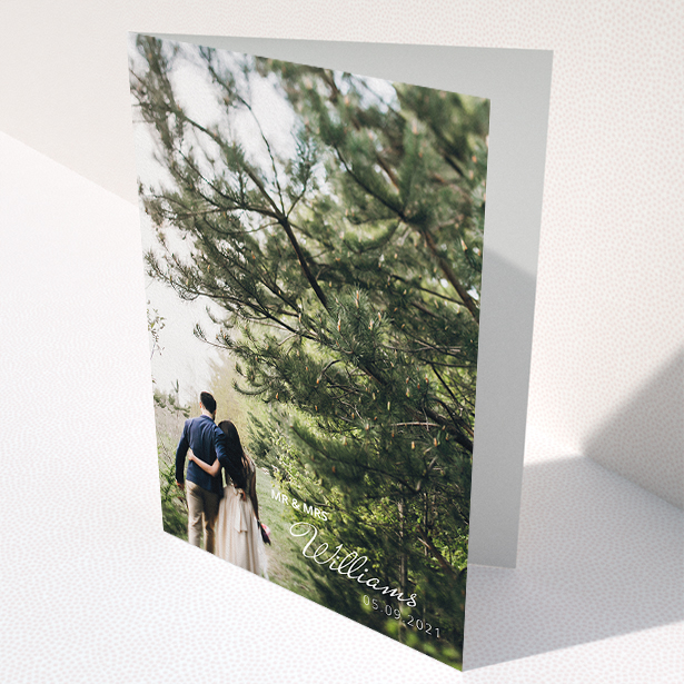 A wedding thank you card named "Thanks Bottom-Right". It is an A5 card in a portrait orientation. It is a photographic wedding thank you card with room for 1 photo. "Thanks Bottom-Right" is available as a folded card, with mainly white colouring.