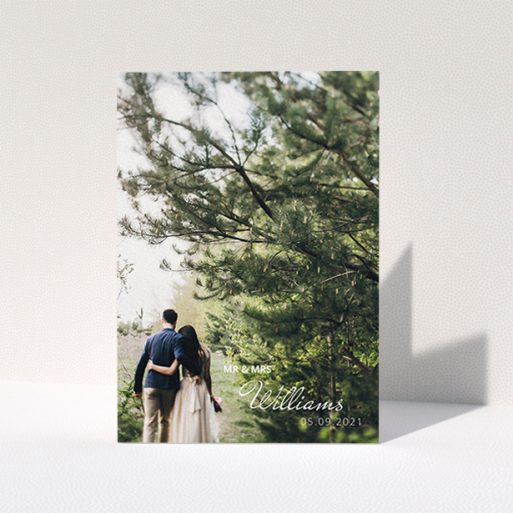 A wedding thank you card design titled "Thanks Bottom-Right". It is an A6 card in a portrait orientation. It is a photographic wedding thank you card with room for 1 photo. "Thanks Bottom-Right" is available as a folded card, with mainly white colouring.