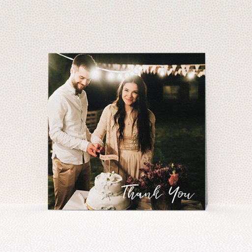 A wedding thank you card design called "Thanks From The Corner". It is a square (148mm x 148mm) card in a square orientation. It is a photographic wedding thank you card with room for 1 photo. "Thanks From The Corner" is available as a flat card, with mainly white colouring.