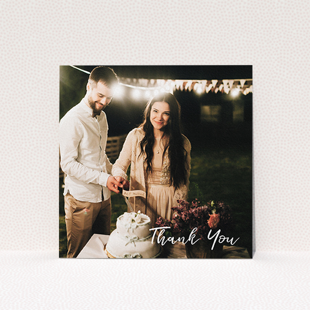 A wedding thank you card design called "Thanks From The Corner". It is a square (148mm x 148mm) card in a square orientation. It is a photographic wedding thank you card with room for 1 photo. "Thanks From The Corner" is available as a flat card, with mainly white colouring.