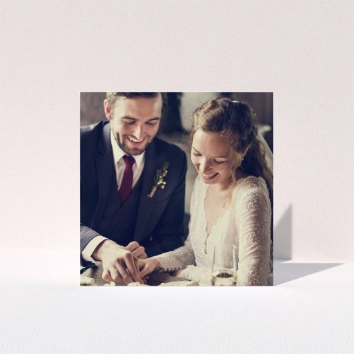 A wedding thank you card design named "Thanks with Just a Square Photo". It is a square (148mm x 148mm) card in a square orientation. It is a photographic wedding thank you card with room for 1 photo. "Thanks with Just a Square Photo" is available as a folded card.