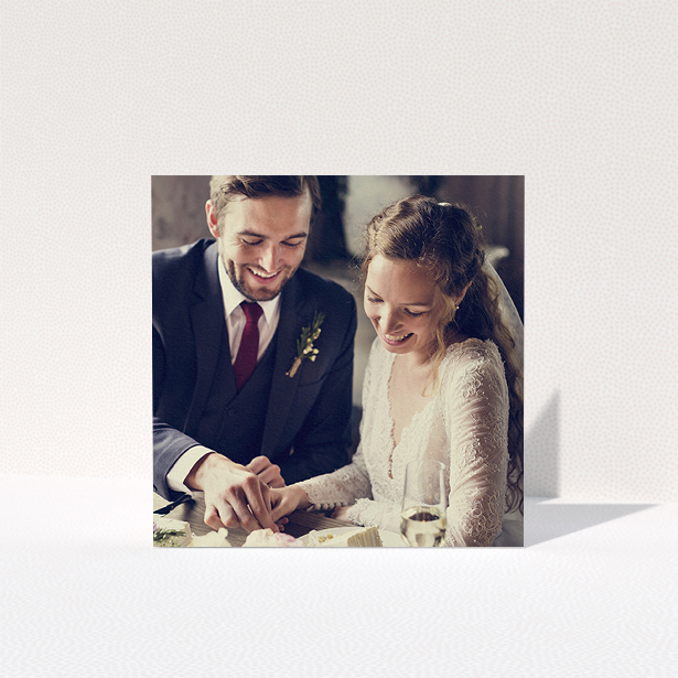 A wedding thank you card design named "Thanks with Just a Square Photo". It is a square (148mm x 148mm) card in a square orientation. It is a photographic wedding thank you card with room for 1 photo. "Thanks with Just a Square Photo" is available as a folded card.