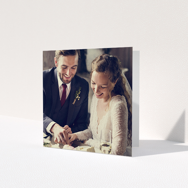 A wedding thank you card design named 'Thanks with Just a Square Photo'. It is a square (148mm x 148mm) card in a square orientation. It is a photographic wedding thank you card with room for 1 photo. 'Thanks with Just a Square Photo' is available as a folded card.