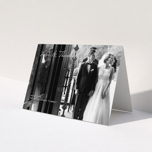 A wedding thank you card template titled 'To the Left Photo'. It is an A5 card in a landscape orientation. It is a photographic wedding thank you card with room for 1 photo. 'To the Left Photo' is available as a folded card, with mainly white colouring.