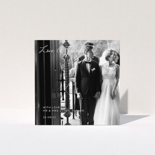 A wedding thank you card template titled "To the Left Photo". It is a square (148mm x 148mm) card in a square orientation. It is a photographic wedding thank you card with room for 1 photo. "To the Left Photo" is available as a folded card, with mainly white colouring.
