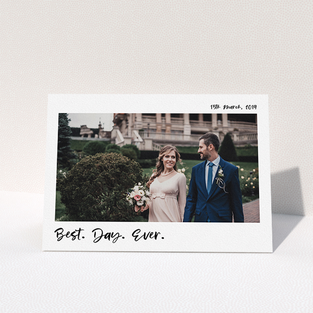 A wedding thank you card named "Top and Bottom Thanks". It is an A5 card in a landscape orientation. It is a photographic wedding thank you card with room for 1 photo. "Top and Bottom Thanks" is available as a folded card, with mainly white colouring.