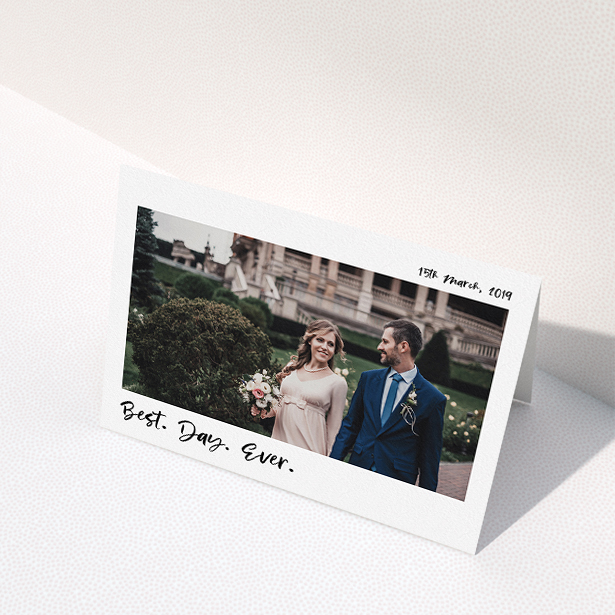 A wedding thank you card named "Top and Bottom Thanks". It is an A5 card in a landscape orientation. It is a photographic wedding thank you card with room for 1 photo. "Top and Bottom Thanks" is available as a folded card, with mainly white colouring.