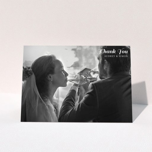 A wedding thank you card design titled "Top-Right". It is an A5 card in a landscape orientation. It is a photographic wedding thank you card with room for 1 photo. "Top-Right" is available as a folded card, with mainly white colouring.