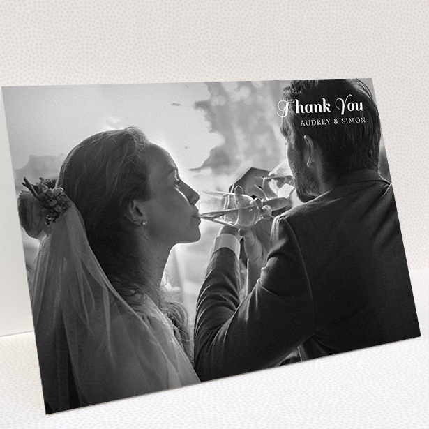 A wedding thank you card design titled "Top-Right". It is an A5 card in a landscape orientation. It is a photographic wedding thank you card with room for 1 photo. "Top-Right" is available as a folded card, with mainly white colouring.