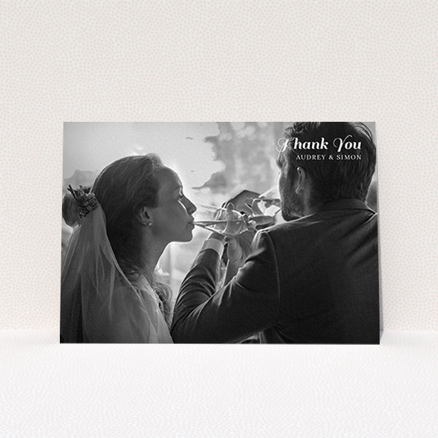 A wedding thank you card template titled "Top-Right". It is an A6 card in a landscape orientation. It is a photographic wedding thank you card with room for 1 photo. "Top-Right" is available as a flat card, with mainly white colouring.