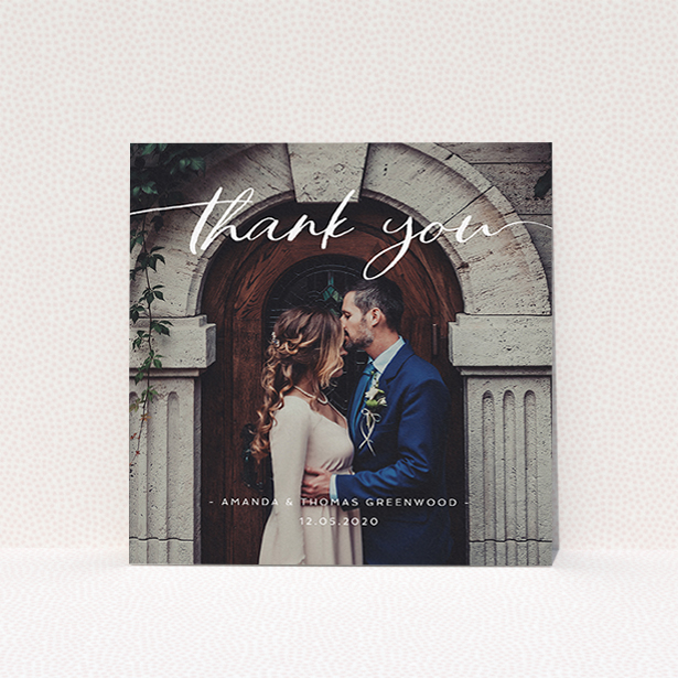 A wedding thank you card design called "Topped and Bottomed". It is a square (148mm x 148mm) card in a square orientation. It is a photographic wedding thank you card with room for 1 photo. "Topped and Bottomed" is available as a flat card, with mainly white colouring.