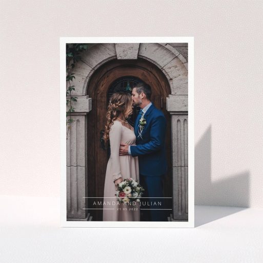 A wedding thank you card named "Tramlines". It is an A5 card in a portrait orientation. It is a photographic wedding thank you card with room for 1 photo. "Tramlines" is available as a folded card, with mainly white colouring.