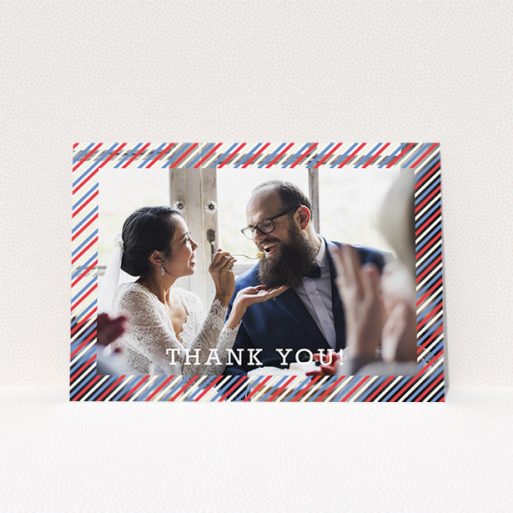 A wedding thank you card design called "Tricolour Photo Frame". It is an A5 card in a landscape orientation. It is a photographic wedding thank you card with room for 1 photo. "Tricolour Photo Frame" is available as a flat card, with mainly white colouring.