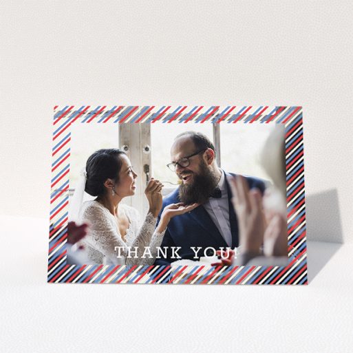 A wedding thank you card named "Tricolour Photo Frame". It is an A5 card in a landscape orientation. It is a photographic wedding thank you card with room for 1 photo. "Tricolour Photo Frame" is available as a folded card, with mainly white colouring.