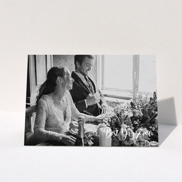 A wedding thank you card named "Truly It Was". It is an A6 card in a landscape orientation. It is a photographic wedding thank you card with room for 1 photo. "Truly It Was" is available as a folded card, with mainly white colouring.