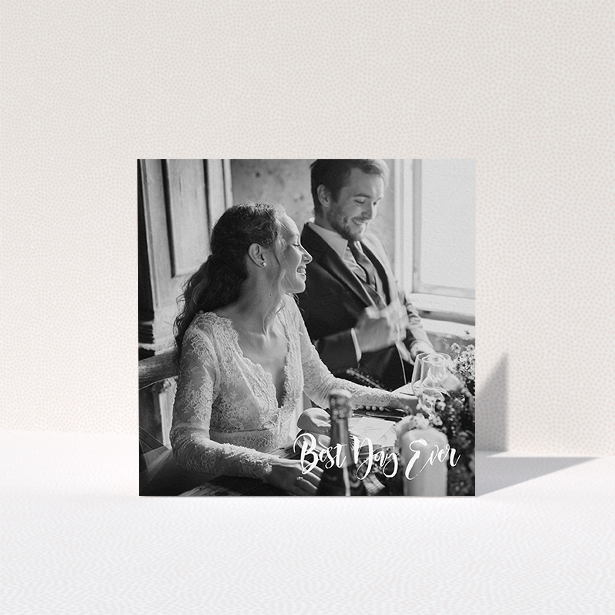 A wedding thank you card named "Truly It Was". It is a square (148mm x 148mm) card in a square orientation. It is a photographic wedding thank you card with room for 1 photo. "Truly It Was" is available as a folded card, with mainly white colouring.