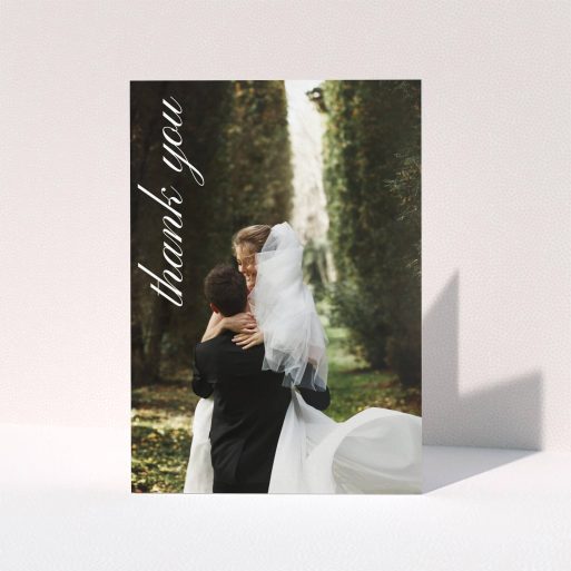 Wedding Thank You Card Design - "Up the Side" A wedding thank you card called "Up the Side". It is an A5 card in a portrait orientation. It is a photographic wedding thank you card with room for 1 photo. "Up the Side" is available as a folded card, with mainly white colouring.