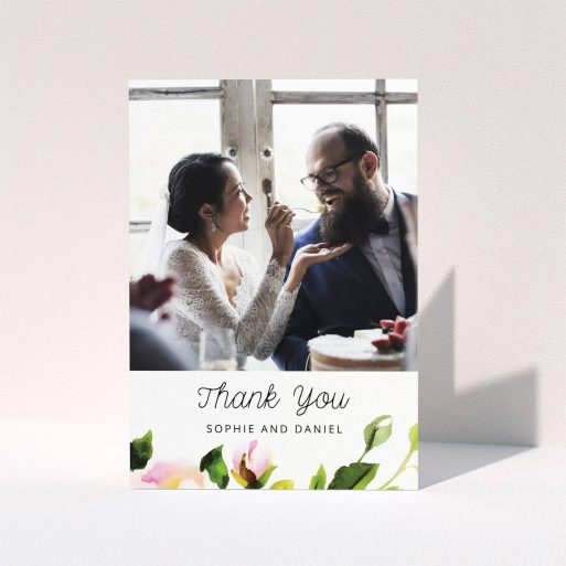 A wedding thank you card called "Watercolour Photo". It is an A5 card in a portrait orientation. It is a photographic wedding thank you card with room for 1 photo. "Watercolour Photo" is available as a folded card, with tones of green, pink and dark green.