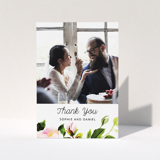 A wedding thank you card called "Watercolour Photo". It is an A5 card in a portrait orientation. It is a photographic wedding thank you card with room for 1 photo. "Watercolour Photo" is available as a folded card, with tones of green, pink and dark green.