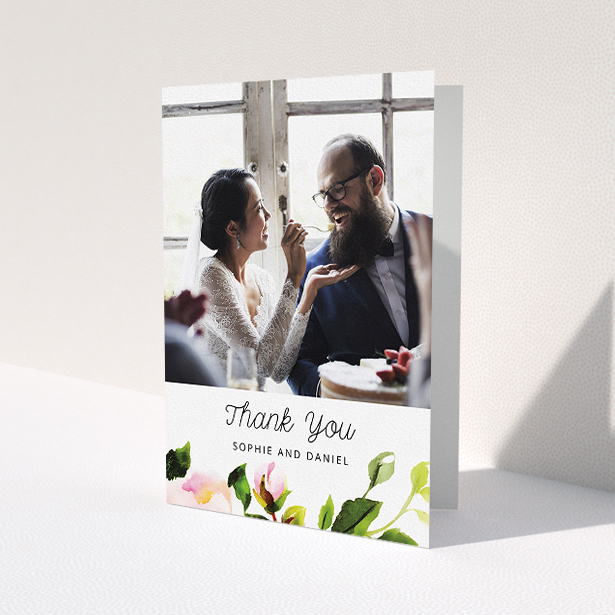 A wedding thank you card called 'Watercolour Photo'. It is an A5 card in a portrait orientation. It is a photographic wedding thank you card with room for 1 photo. 'Watercolour Photo' is available as a folded card, with tones of green, pink and dark green.