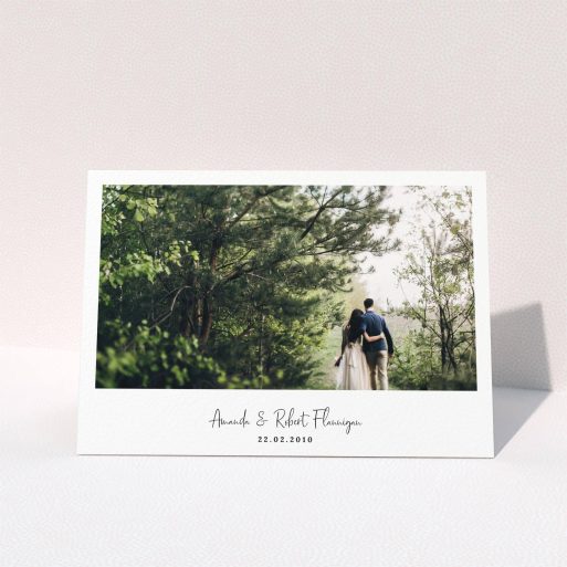 A wedding thank you card called "White Space with Photo". It is an A5 card in a landscape orientation. It is a photographic wedding thank you card with room for 1 photo. "White Space with Photo" is available as a folded card, with mainly white colouring.