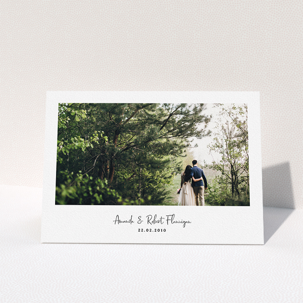 A wedding thank you card called "White Space with Photo". It is an A5 card in a landscape orientation. It is a photographic wedding thank you card with room for 1 photo. "White Space with Photo" is available as a folded card, with mainly white colouring.