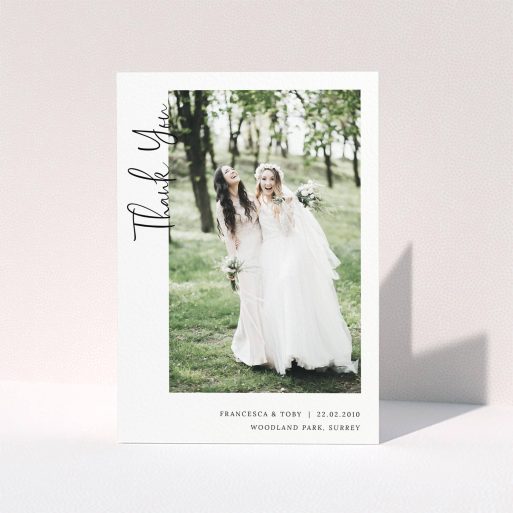 A wedding thank you card design called "Written up the Side". It is an A5 card in a portrait orientation. It is a photographic wedding thank you card with room for 1 photo. "Written up the Side" is available as a folded card, with mainly white colouring.
