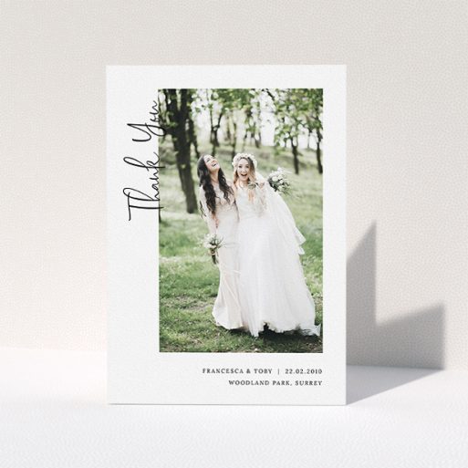 A wedding thank you card design called "Written up the Side". It is an A5 card in a portrait orientation. It is a photographic wedding thank you card with room for 1 photo. "Written up the Side" is available as a folded card, with mainly white colouring.