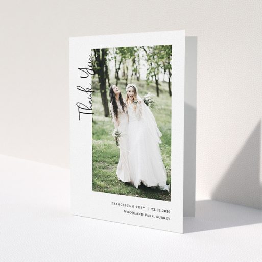 A wedding thank you card design called 'Written up the Side'. It is an A5 card in a portrait orientation. It is a photographic wedding thank you card with room for 1 photo. 'Written up the Side' is available as a folded card, with mainly white colouring.