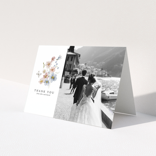 Wedding thank you card design with floral illustration and a photo of a bride and groom.